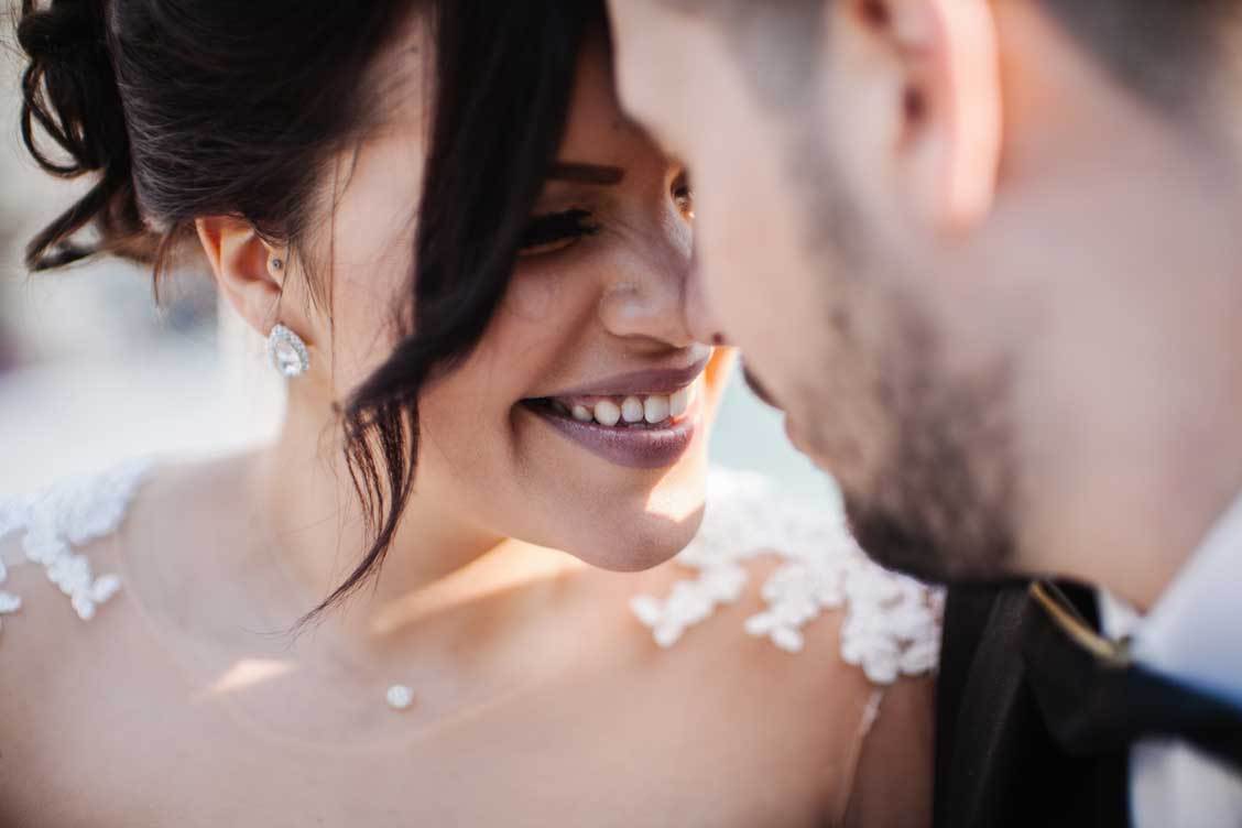 couple-closeup-nose-to-nose-giggling-Wedding-Photographer-nyc